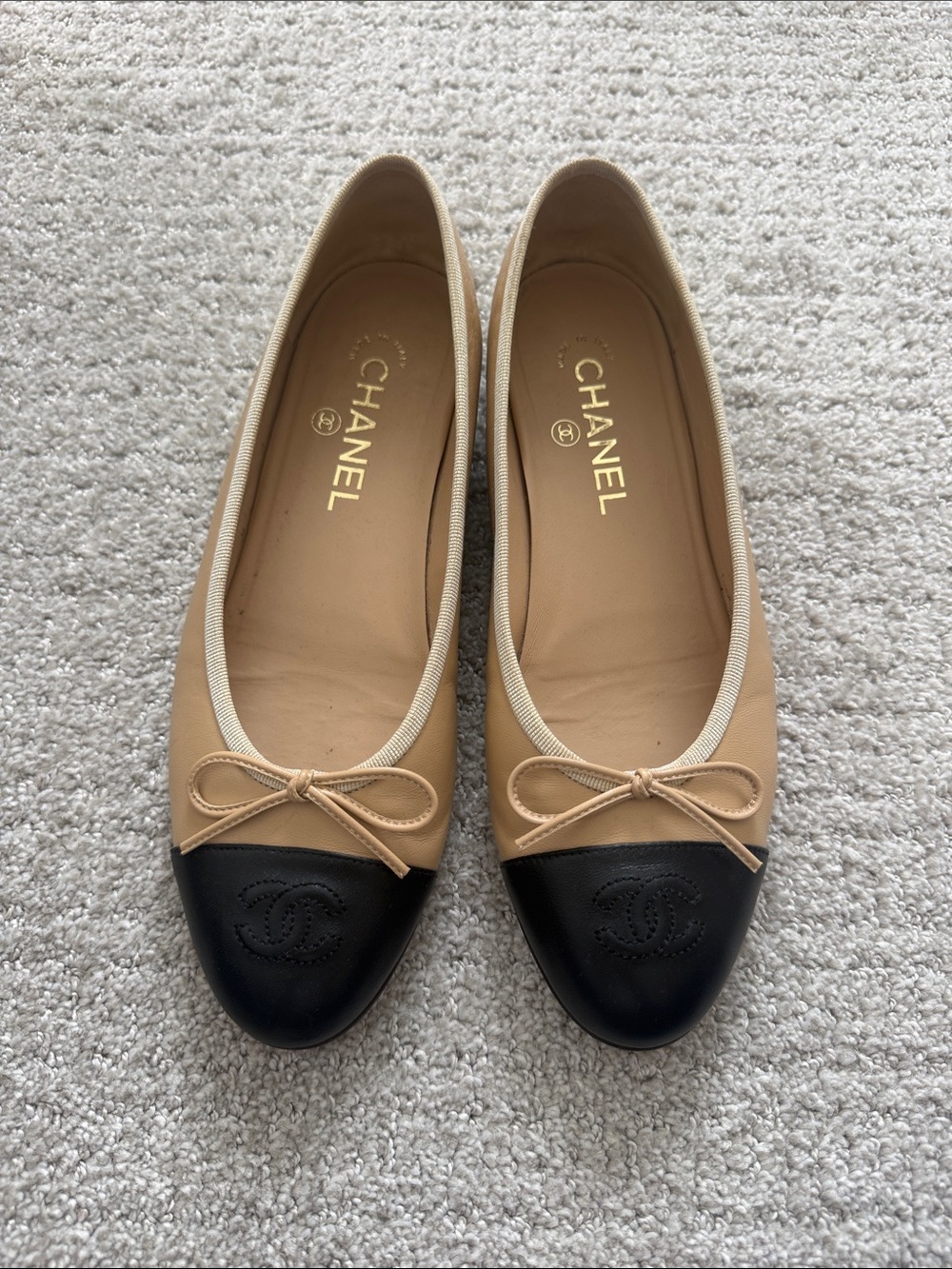 CHANEL Beige and Black Leather Cap-Toe Ballet Flats